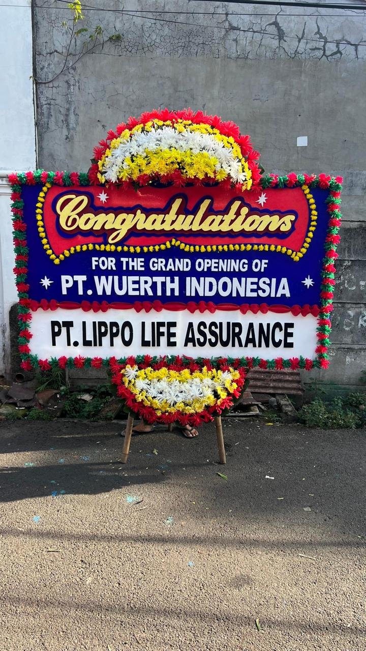 Papan bunga congratulations grand opening PT Wuerth Indonesia rangkaian warna merah biru
