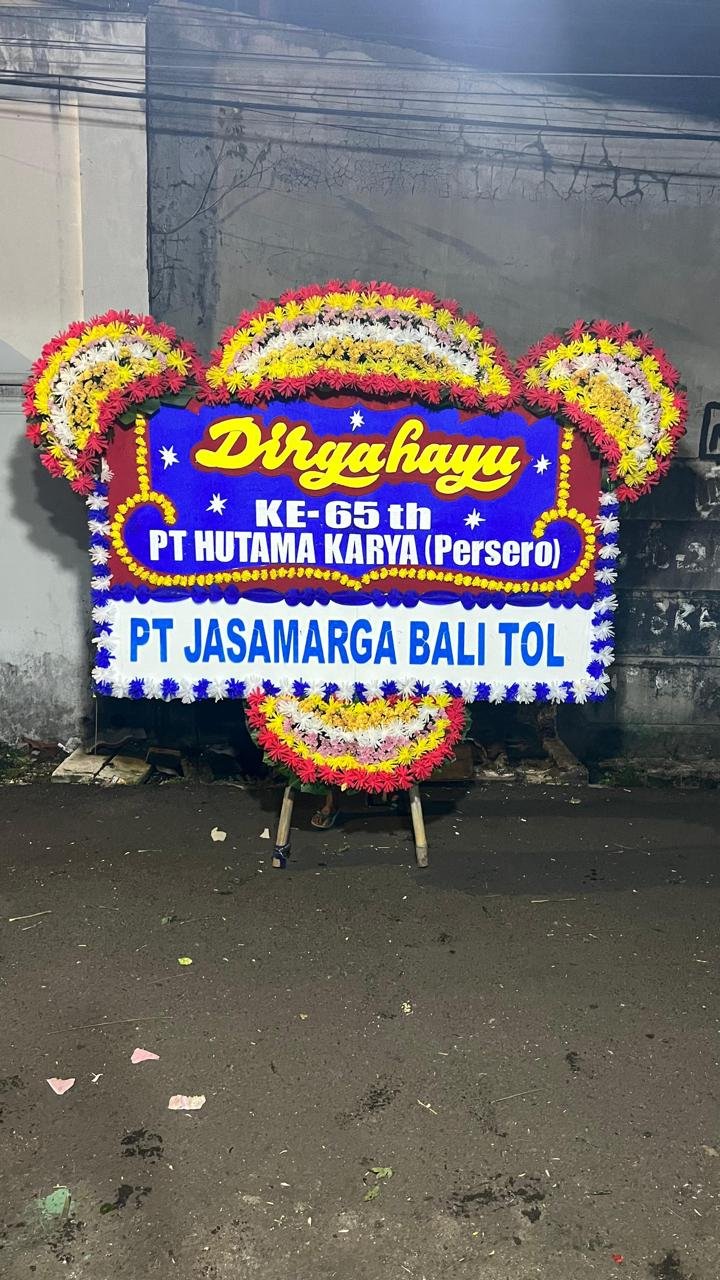 Papan bunga dirgahayu ke-65 PT Hutama Karya Persero dari PT Jasamarga Bali Tol