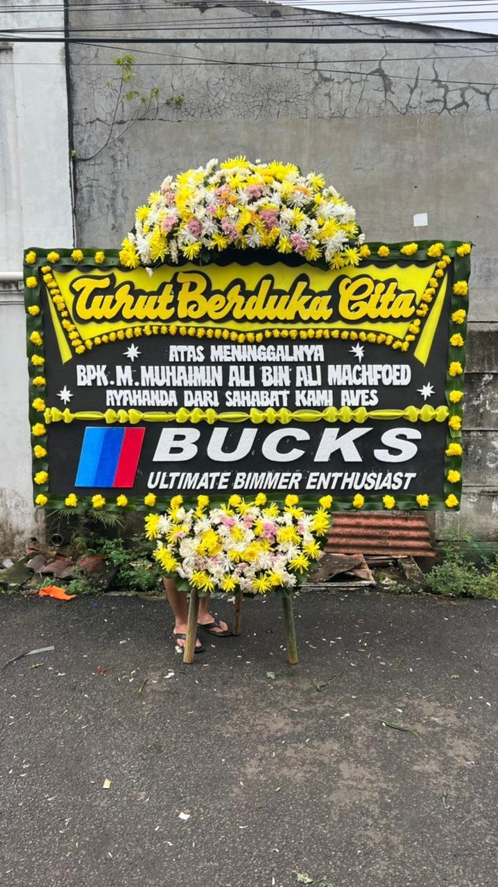Papan bunga duka cita Apreza Darul Putra Kepala Kejaksaan Negeri Tangerang Selatan