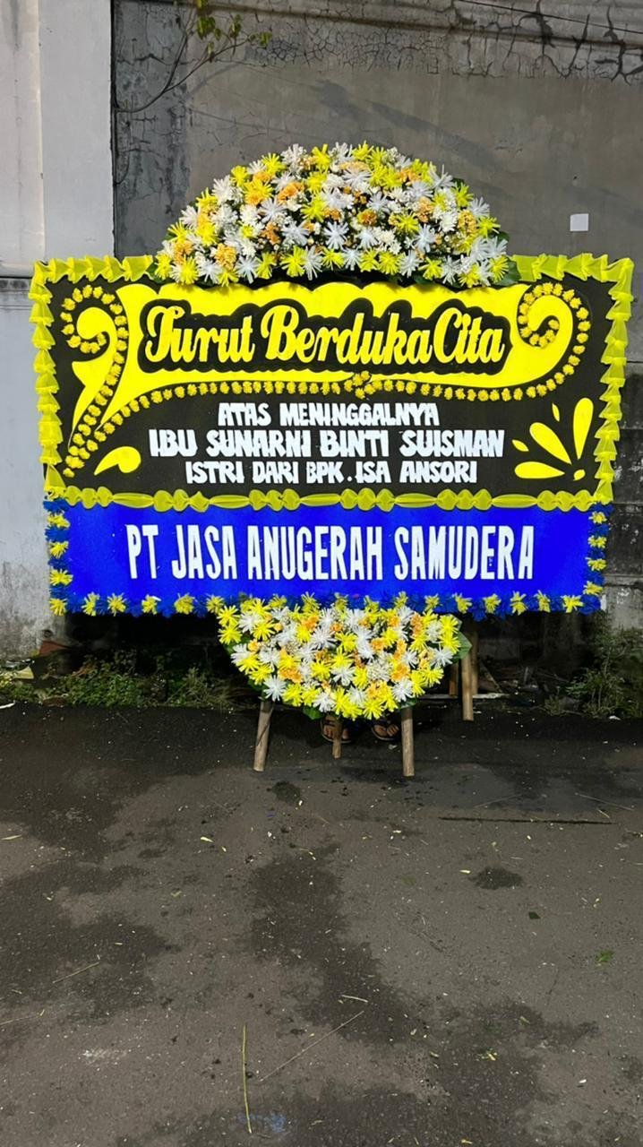 Papan bunga duka cita PT Jasa Anugerah Samudera untuk Ibu Sunarni